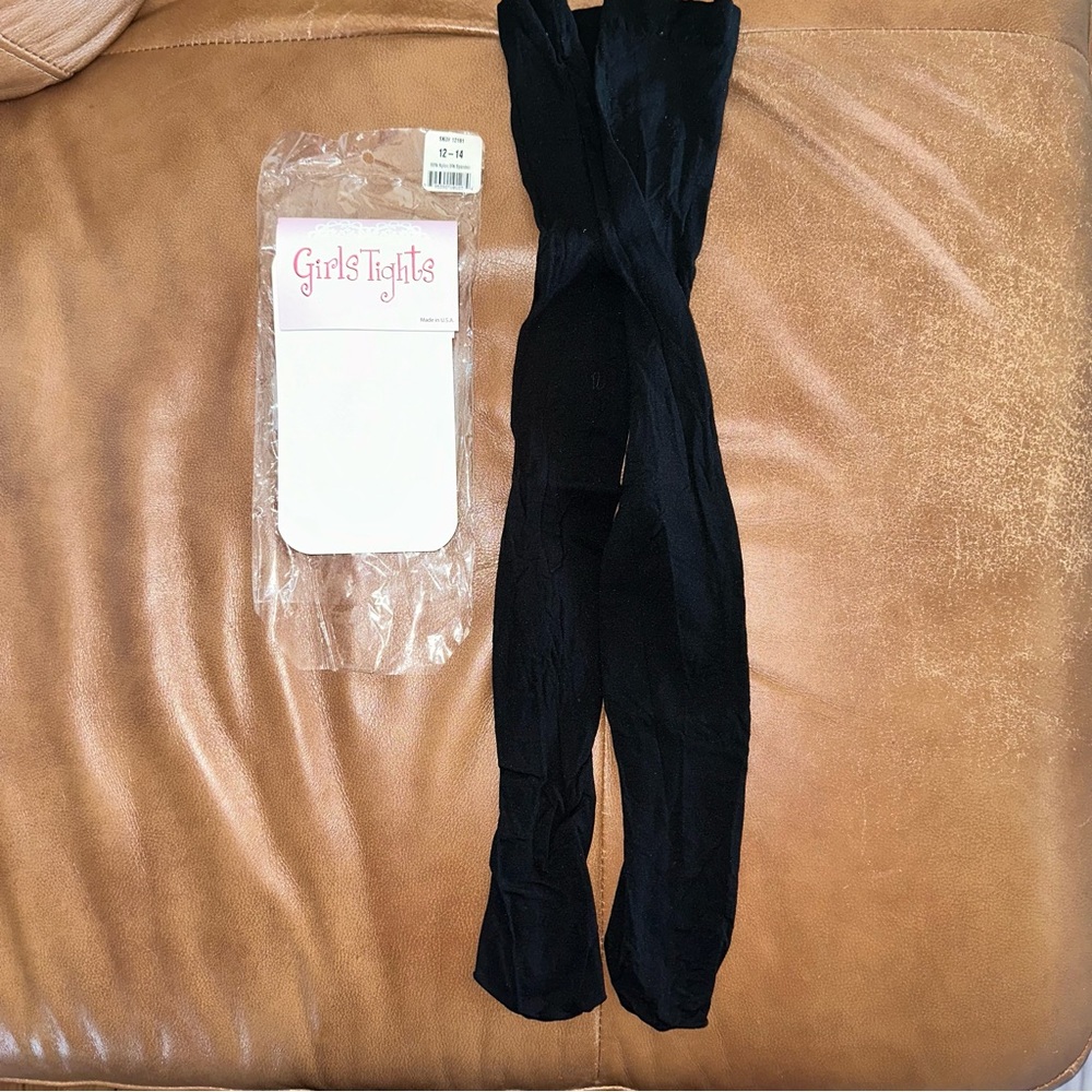 New in the package black tights. It says 12-14 (inseam 17”) - Picture 2 of 5